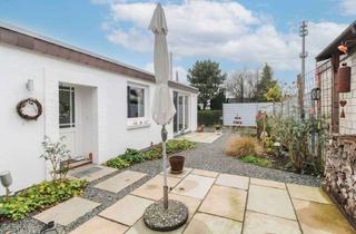 Haus kaufen in 23560 St. Jürgen, Modernisierter Bungalow im Gewerbegebiet zur flexiblen Nutzung