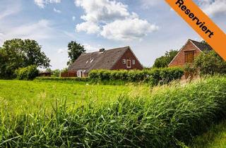 Einfamilienhaus kaufen in 26553 Dornum, Familienfreundliches Einfamilienhaus mit großzügigem Grundstück in Küstennähe