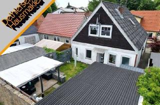 Einfamilienhaus kaufen in 25746 Heide, Teilmodernisiertes Einfamilienhaus mit pflegeleichtem Grundstück in Heide/Mitte, ca. 400 m zum Heide