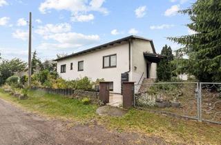 Haus kaufen in 06120 Dölau, Charmanter Bungalow mit großem Grundstück in Halle-Dölau