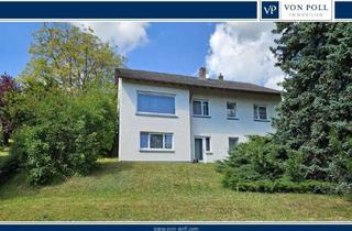 Einfamilienhaus kaufen in 97222 Rimpar, Familienfreundliches Einfamilienhaus mit Doppelgarage und ELW in ruhiger Lage zu verkaufen