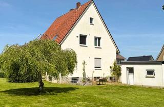 Haus kaufen in 32278 Kirchlengern, Umfassend modernisiertes Zweifamilienhaus! In wenigen Schritten zum Effizienzhaus 70 EE!