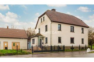 Haus kaufen in 33818 Leopoldshöhe, Charmantes Zweifamilienhaus mit großem Grundstück in ruhiger Lage