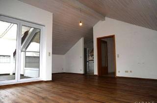 Wohnung kaufen in 71549 Auenwald, Auenwald - Dachgeschoss-Wohnung mit viel Charme und Loggia + Garage