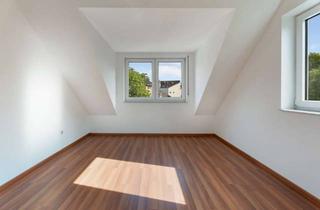 Wohnung kaufen in 64289 Darmstadt-Nord, Bezugsfertige Dachgeschosswohnung im Herzen des Martinsviertels mit Tiefgaragenstellplatz