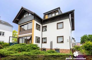 Mehrfamilienhaus kaufen in 63517 Rodenbach, BERK Immobilien – Vielseitiges Mehrfamilienhaus mit Einliegerwohnung und Nebengebäude