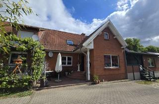 Reihenhaus kaufen in Dorfstraße 22, 17207 Groß Kelle, Charmantes Reihenhaus mit Doppelgarage und Carport