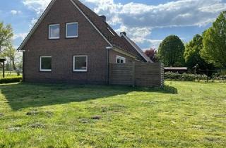 Doppelhaushälfte kaufen in 26409 Wittmund, Haus mit Dachterrasse und Carport in ruhiger Wohnlage!
