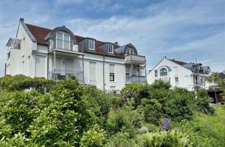 Wohnung kaufen in 86424 Dinkelscherben, Charmante Dachgeschosswohnung mit Balkon und Blick ins Grüne