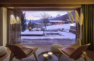 Wohnung kaufen in 83483 Bischofswiesen, Traumlage mit Watzmannblick: 3-geschossige Eigentumswohnung mit privatem Garten & Terrasse