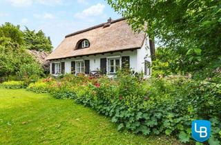 Haus kaufen in 24306 Plön, Malerisches Reetdachhaus nahe des Großen Plöner Sees – Wohnen, wo andere Urlaub machen