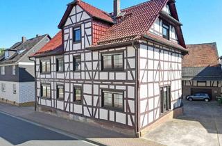 Haus kaufen in 34225 Baunatal, Baunatal - Großes Wohnhaus mit Scheune und Bauland im Ortskern von Großenritte