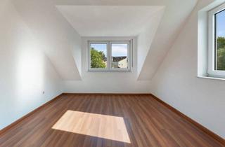 Wohnung kaufen in 64289 Darmstadt, Darmstadt - Bezugsfertige Dachgeschosswohnung im Herzen des Martinsviertels mit Tiefgaragenstellplatz