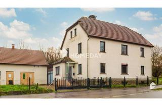 Haus kaufen in 33818 Leopoldshöhe, Leopoldshöhe - Charmantes Zweifamilienhaus mit großem Grundstück in ruhiger Lage