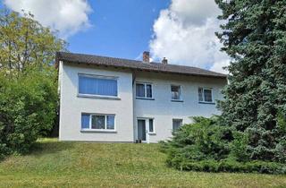 Einfamilienhaus kaufen in 97222 Rimpar, Rimpar - Familienfreundliches Einfamilienhaus mit Doppelgarage und ELW in ruhiger Lage zu verkaufen