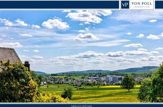Wohnung kaufen in 61267 Neu-Anspach, Großzügig Wohnen auf zwei Etagen mit Fernblick, Feldrandlage, 2 Terrassen, Garten & Doppelgarage