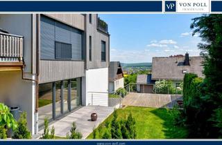 Wohnung kaufen in 61267 Neu-Anspach, Haus-im-Haus-Konzept mit Garten, Terrassen, Doppelgarage, Einliegerbereich, Feldrandlage & Fernblick