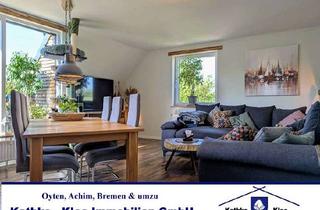 Wohnung kaufen in 28876 Oyten, Maisonettewohnung in Toplage von Oyten: 4-Zimmer-Obergeschosswohnung mit Loggia und eigenem Garten