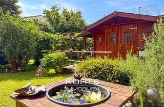 Wohnung kaufen in 88267 Vogt, Wohnen wie im eigenen Haus - Charmante 3-Zimmer Wohnung mit idyllischem Traumgarten