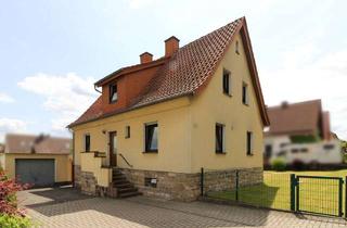 Einfamilienhaus kaufen in 36103 Flieden, Einfamilienhaus mit Garage und Gartenidylle in Flieden