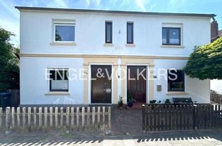 Doppelhaushälfte kaufen in 26389 Rüstringer Stadtpark, Doppelhaushälfte mit Potential in Rüstersiel