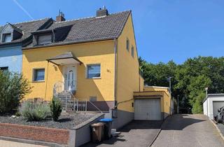 Doppelhaushälfte kaufen in 50321 Brühl, Gemütliche Doppelhaushälfte mit 3 Garagen und großem Garten in 50321 Brühl