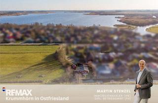Haus kaufen in 26624 Südbrookmerland, „Auszeitdomizil“ am Großen Meer – idyllische Freizeitoase mit Steganlage und Kanalzugang