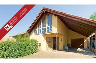 Haus kaufen in 67308 Einselthum, Einselthum - Architektonisch ansprechender Bungalow mit Wintergarten und Garage auf großzügigem Grundstück