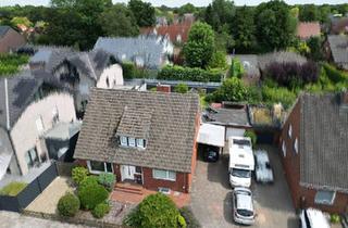 Einfamilienhaus kaufen in 26871 Papenburg, Papenburg - Einfamilienhaus mit großem Süd-Grundstück und Doppelgarage