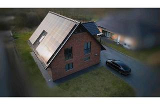 Einfamilienhaus kaufen in 25727 Süderhastedt, Süderhastedt - Modernes KfW40+ EFH in idyllischer Lage