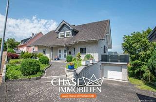 Haus kaufen in 37619 Hehlen, Kleinod mit Panorama-Weitsicht – Exklusives Ein-/Zweifamilienhaus mit Einliegerwohnung in Hehlen!