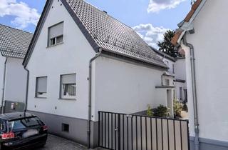 Mehrfamilienhaus kaufen in 65479 Raunheim, Mehrfamilienhaus mit Potential in Raunheim
