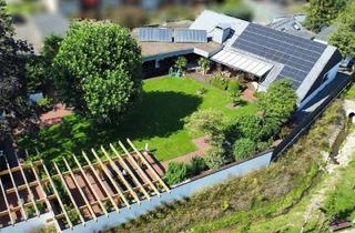 Haus kaufen in 33829 Borgholzhausen, Borgholzhausen - Beeindruckende Liegenschaft mit harmonisch angelegtem Garten in Borgholzhausen