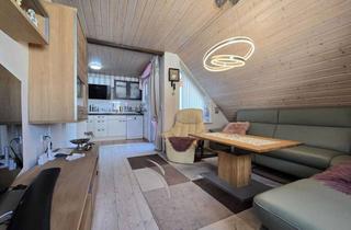 Wohnung kaufen in 72649 Wolfschlugen, Dachgeschosswohnung mit Dachterrasse in Wolfschlugen