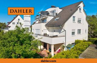 Wohnung kaufen in 63303 Dreieich, Exklusive Gartenwohnung mit großer Terrasse und zwei Tiefgaragenstellplätzen