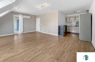 Wohnung kaufen in 55576 Sprendlingen, Einziehen oder vermieten – 2-Zimmer-Dachgeschosswohnung mit Balkon & Stellplatz in Rheinhessen