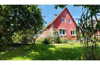 Einfamilienhaus kaufen in 24955 Harrislee, Ein Familienhaus an der Marienhölzung in zentraler, ruhiger Lage