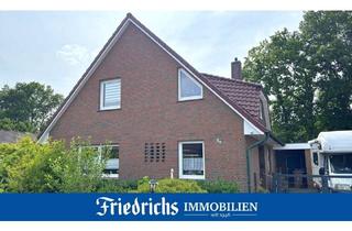 Einfamilienhaus kaufen in 26655 Westerstede, Einfamilienhaus mit Wintergarten und Garagen-/Werkstattgebäude in ruhiger Wohnlage in WST-Ocholt