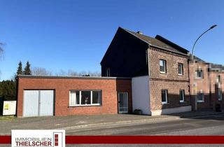 Haus kaufen in 52531 Übach-Palenberg, Großzügiges Wohnhaus mit zwei Anbauten und weitläufigem Grundstück
