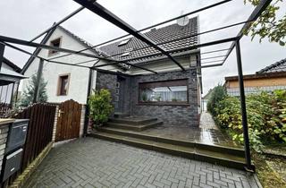 Haus kaufen in 53773 Hennef, Zwiei bis Drei Familien-Haus und Garagen