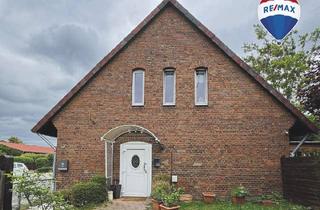 Doppelhaushälfte kaufen in 21379 Scharnebeck, Vermietete Doppelhaushälfte mit Scheune mitten in Scharnebeck