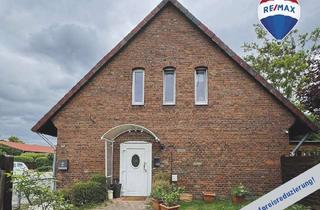 Doppelhaushälfte kaufen in 21379 Scharnebeck, Vermietete Doppelhaushälfte mit Scheune mitten in Scharnebeck