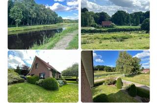 Einfamilienhaus kaufen in 26639 Wiesmoor, Wiesmoor - Entschleunigung direkt am EMS-JADE-KANAL ! Einfamilienhaus & großes Baugrundstück daneben nach §34 BauGB!