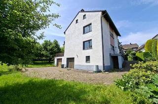 Haus kaufen in 58553 Halver, Halver - Freistehendes Zweifamilienwohnhaus mit 2 Garagen und Garten