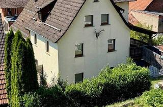 Haus kaufen in 63869 Heigenbrücken, Heigenbrücken - Mit Potential! Zweifamilienhaus mit Doppelcarport und Gartenhaus