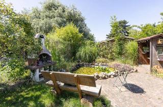 Haus kaufen in 52445 Titz, 2 in 1 - Lebensqualität mit viel Grün plus Cashflow