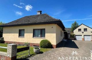Einfamilienhaus kaufen in 27639 Nordholz, Einfamilienhaus mit Wintergarten und Kamin auf großzügigem Grundstück in Nordholz