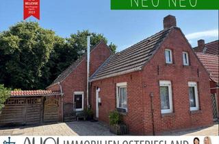 Einfamilienhaus kaufen in 26736 Krummhörn, Sanierungsbedürftiges Einfamilienhaus mit Carport, kleinem Garten in zentraler Lage.