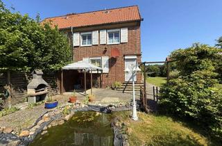 Doppelhaushälfte kaufen in 29328 Faßberg, Doppelhaushälfte auf großem Grundstück
