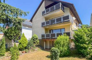 Mehrfamilienhaus kaufen in 76698 Ubstadt-Weiher, Großzügiges Mehrfamilienhaus mit 3 Wohneinheiten, Garten und 3 Garagenplätzen
